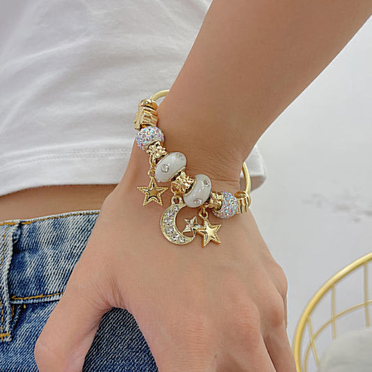 Rockyu ブレスレット レディース ゴールド スター&ムーンチャーム ツイストバングル 金属アレルギー対応
