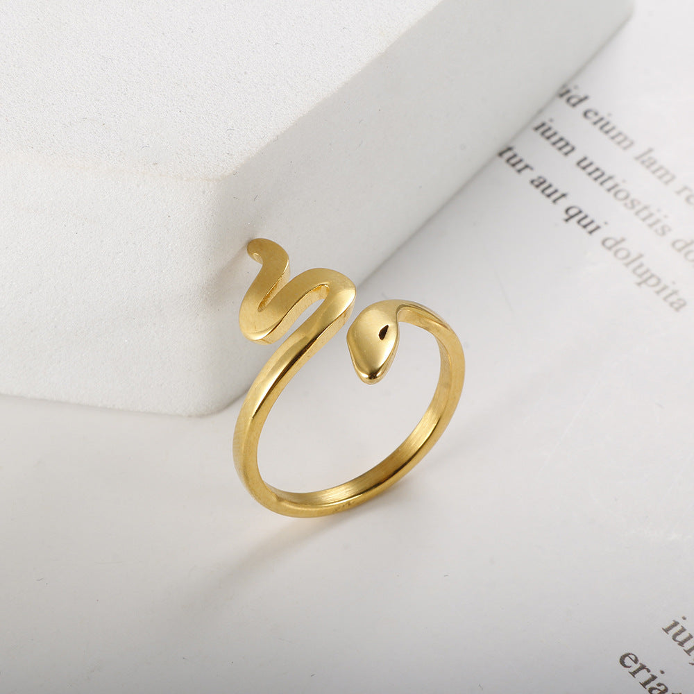 レディース スネークリング｜チタン製 ゴールド IPメッキ 指輪 フリーサイズ