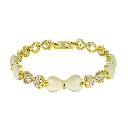 ハート＆リボンの猫目石ブレスレット｜ジルコニア×ローズゴールド＆ゴールド