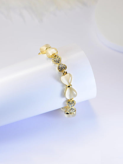 ハート＆リボンの猫目石ブレスレット｜ジルコニア×ローズゴールド＆ゴールド