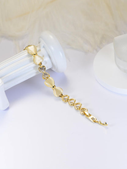 ハート＆リボンの猫目石ブレスレット｜ジルコニア×ローズゴールド＆ゴールド