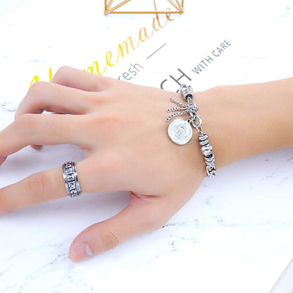 Rockyu レディースブレスレット シルバー チタン 円珠 コイン刻印 トーテム 御守風