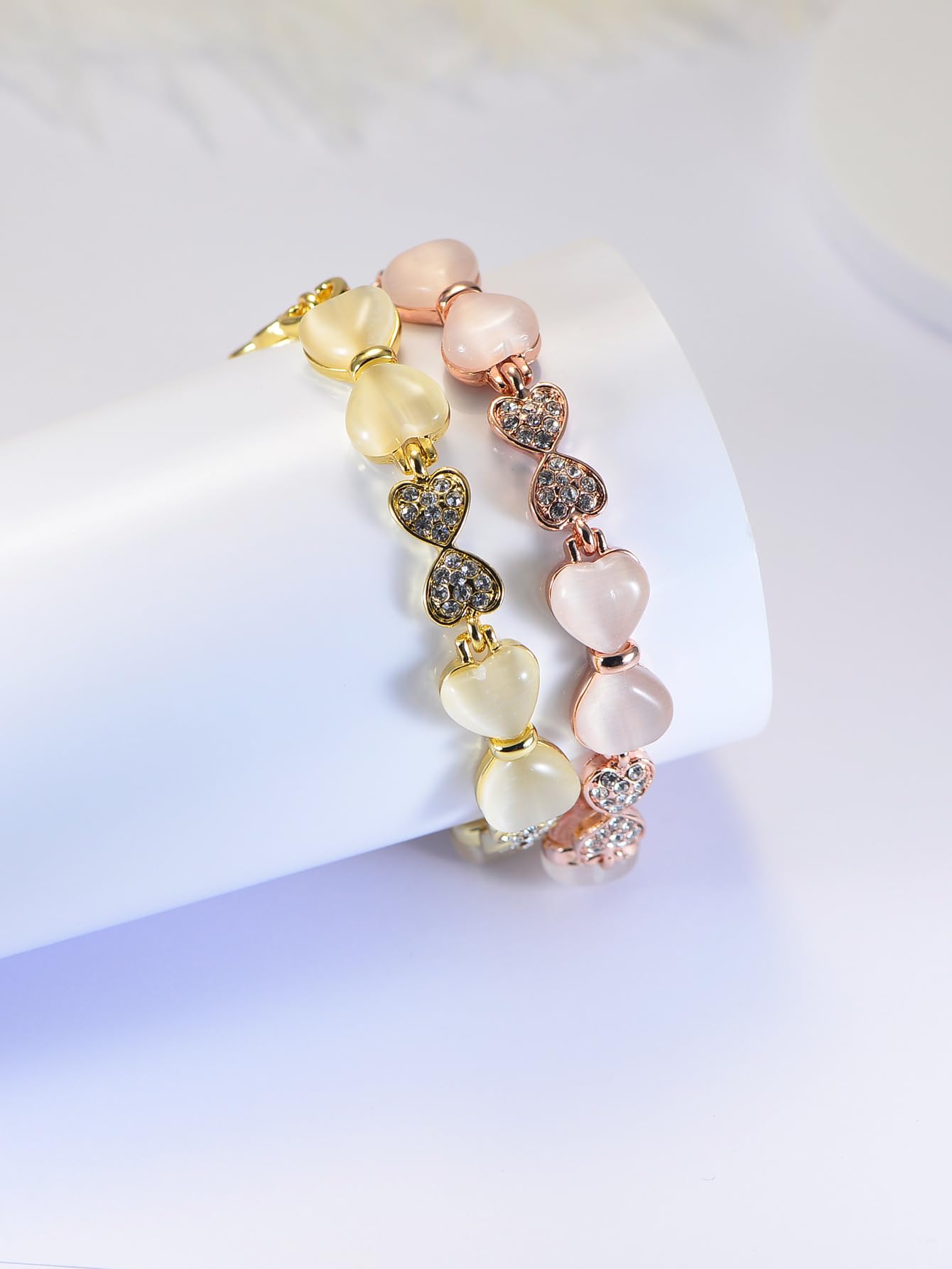 ハート＆リボンの猫目石ブレスレット｜ジルコニア×ローズゴールド＆ゴールド