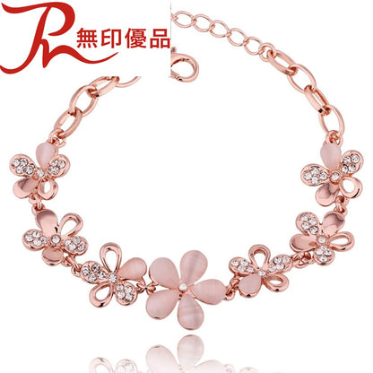花モチーフ ピンクゴールドブレスレット｜18Kカラー×ラインストーンの輝き