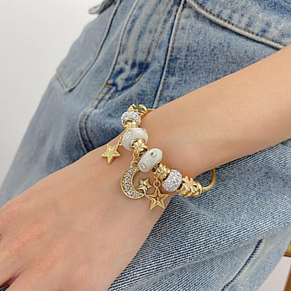 Rockyu ブレスレット レディース ゴールド スター＆ムーンチャーム ツイストバングル 金属アレルギー対応