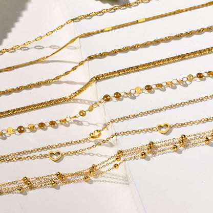 アンクレット レディース ゴールド ステンレス 18金仕上げ 風車モチーフ ビーズ 透かし彫り 金属アレルギー対応