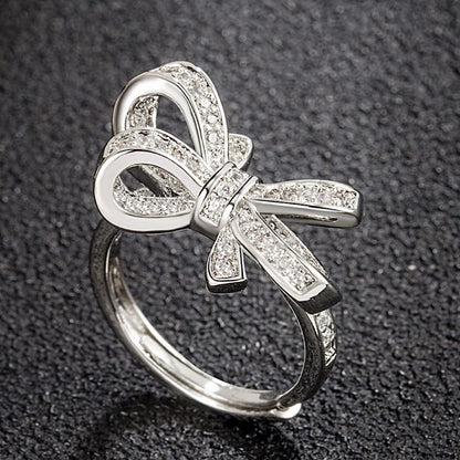 Rockyu レディース フリーサイズ リボンリング｜ピンクゴールド＆シルバー 多粒ダイヤ風デザイン