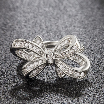 Rockyu レディース フリーサイズ リボンリング｜ピンクゴールド＆シルバー 多粒ダイヤ風デザイン