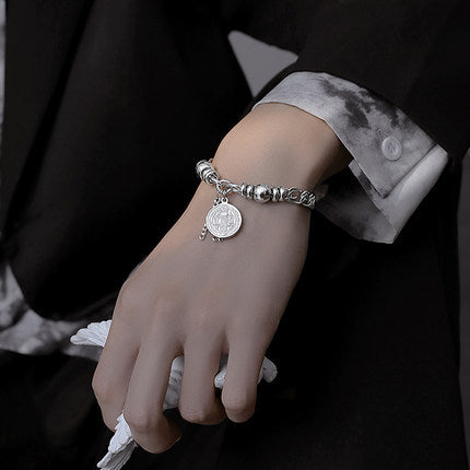 Rockyu レディースブレスレット シルバー チタン 円珠 コイン刻印 トーテム 御守風
